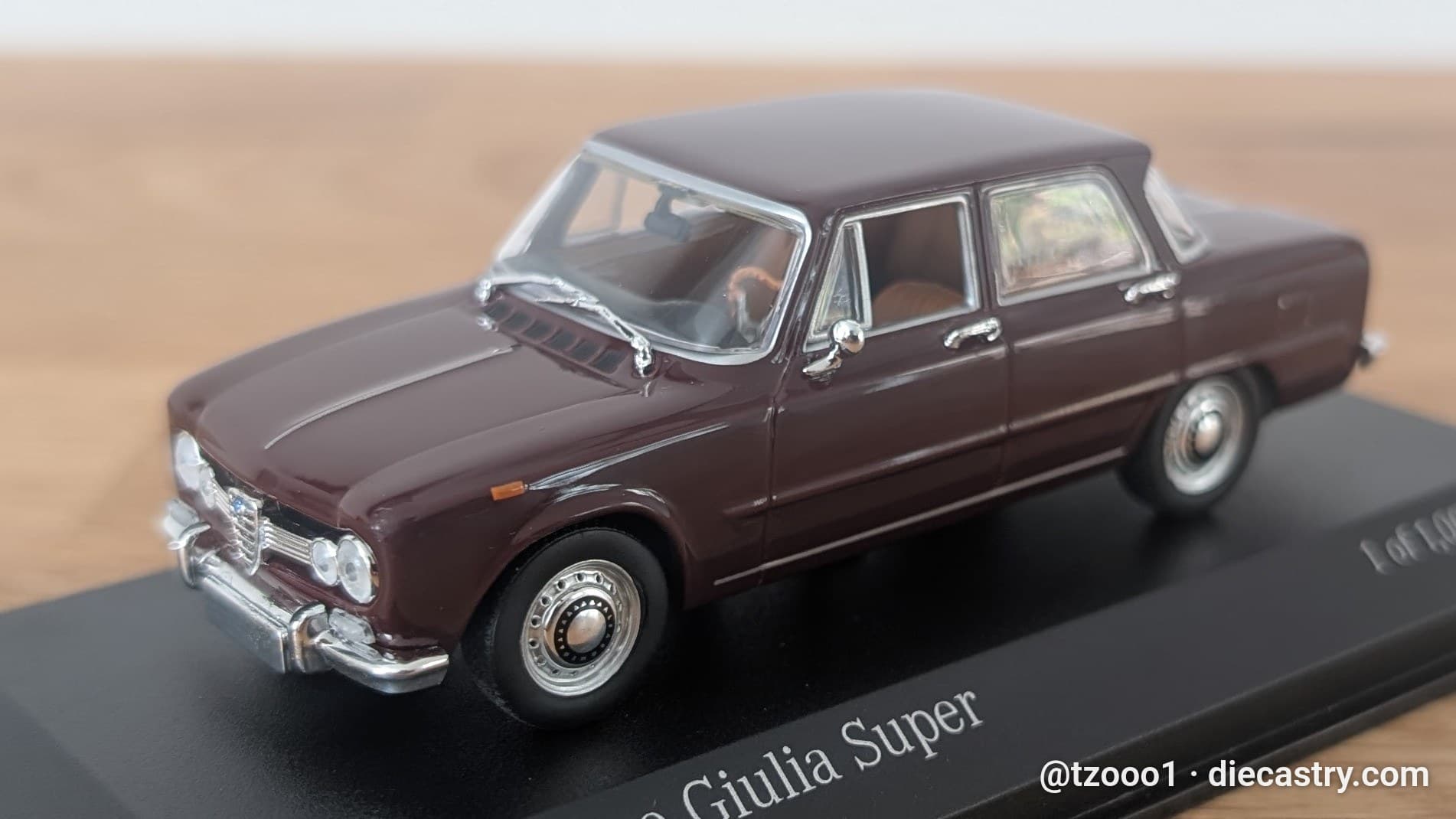 1970 Alfa Romeo Giulia Super 1:43 scale diecast model by Minichamps in Rosso Amaranto