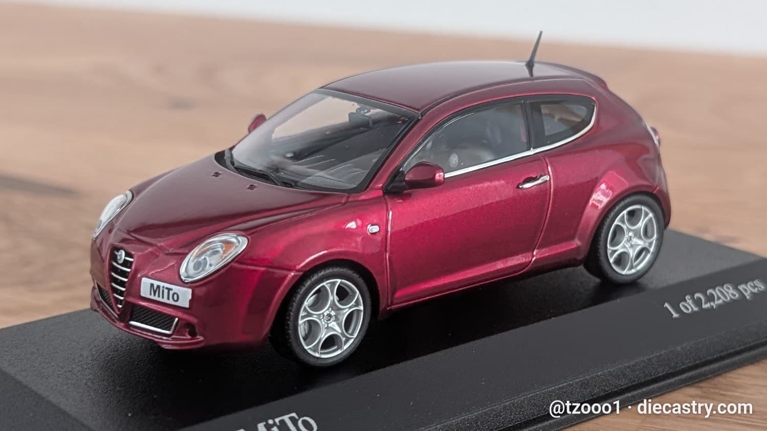 2009 Alfa Romeo Mito 1:43 scale diecast model by Minichamps in Rosso Competizione