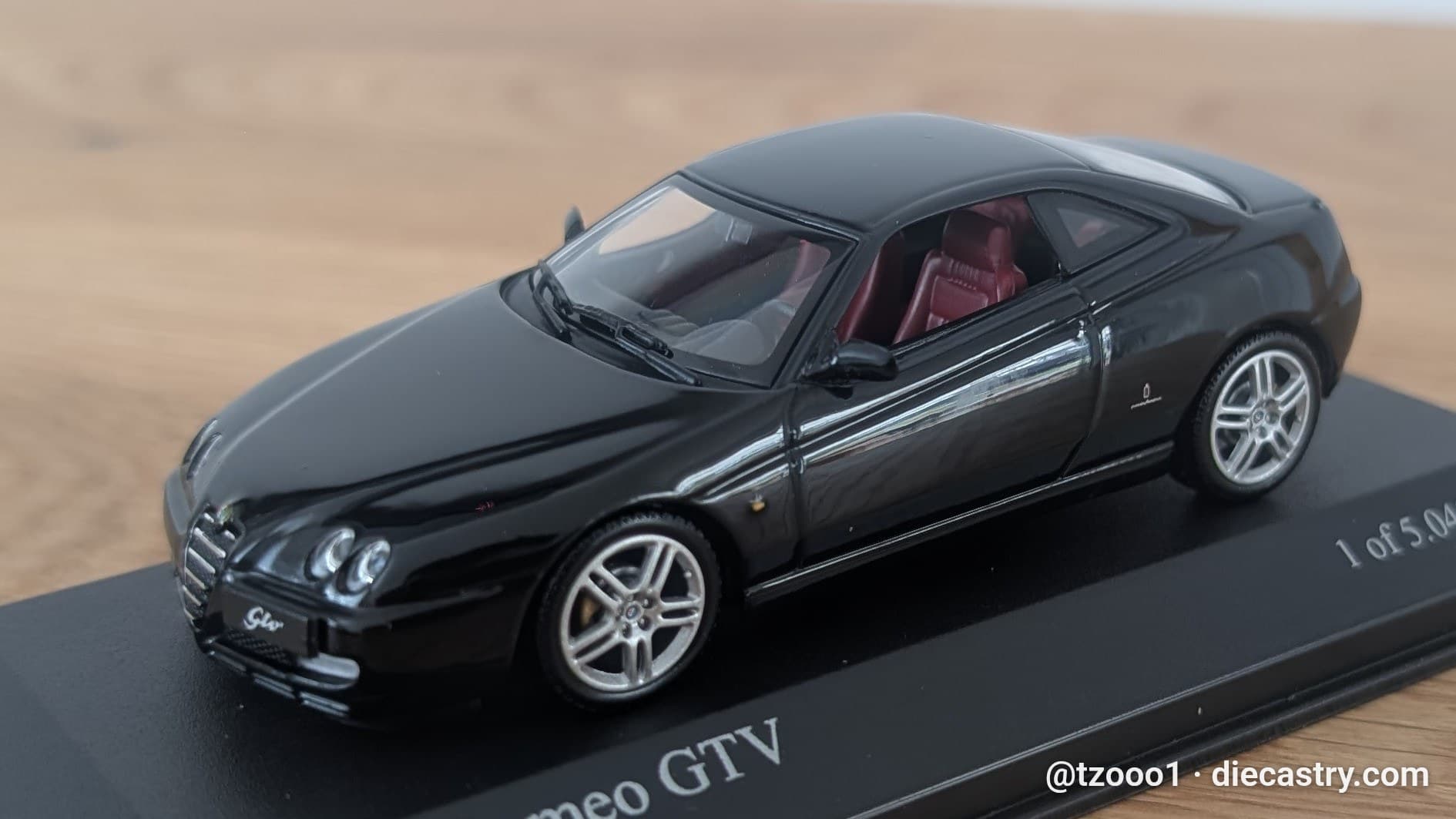 2003 Alfa Romeo GTV 1:43 scale diecast model by Minichamps in Nero Kyalami