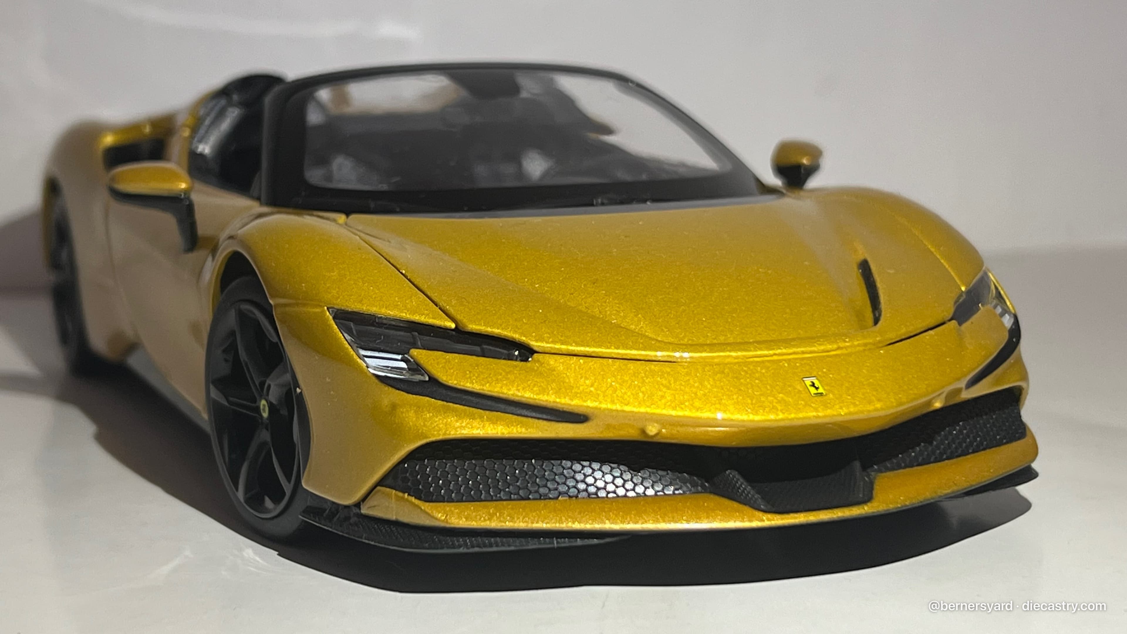 2022 Ferrari SF90 Spyder 1:18 scale diecast model by Maisto in Metallic Gold
