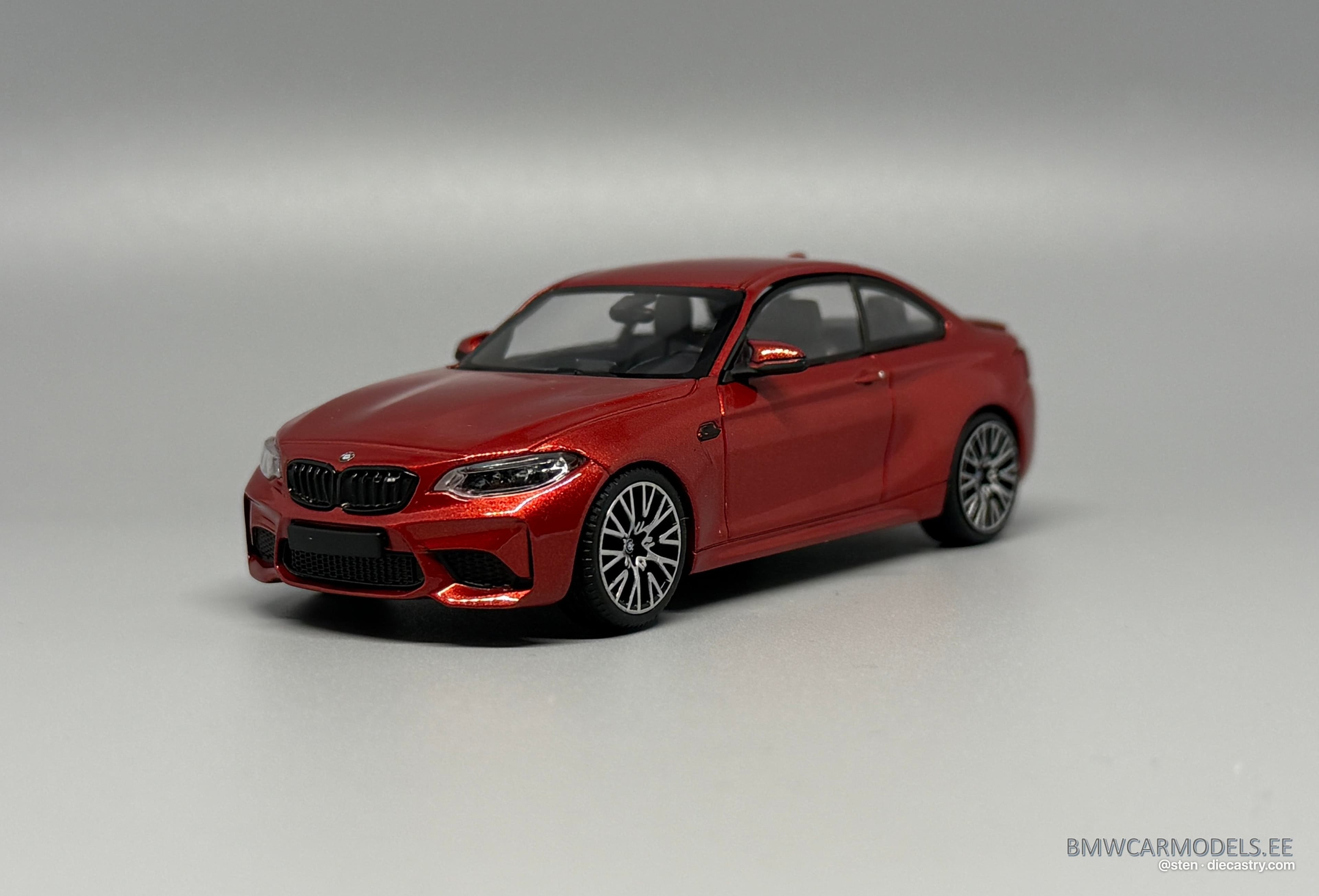 2019 BMW M2 Competition 1:43 scale diecast model by Minichamps in Orange metallic