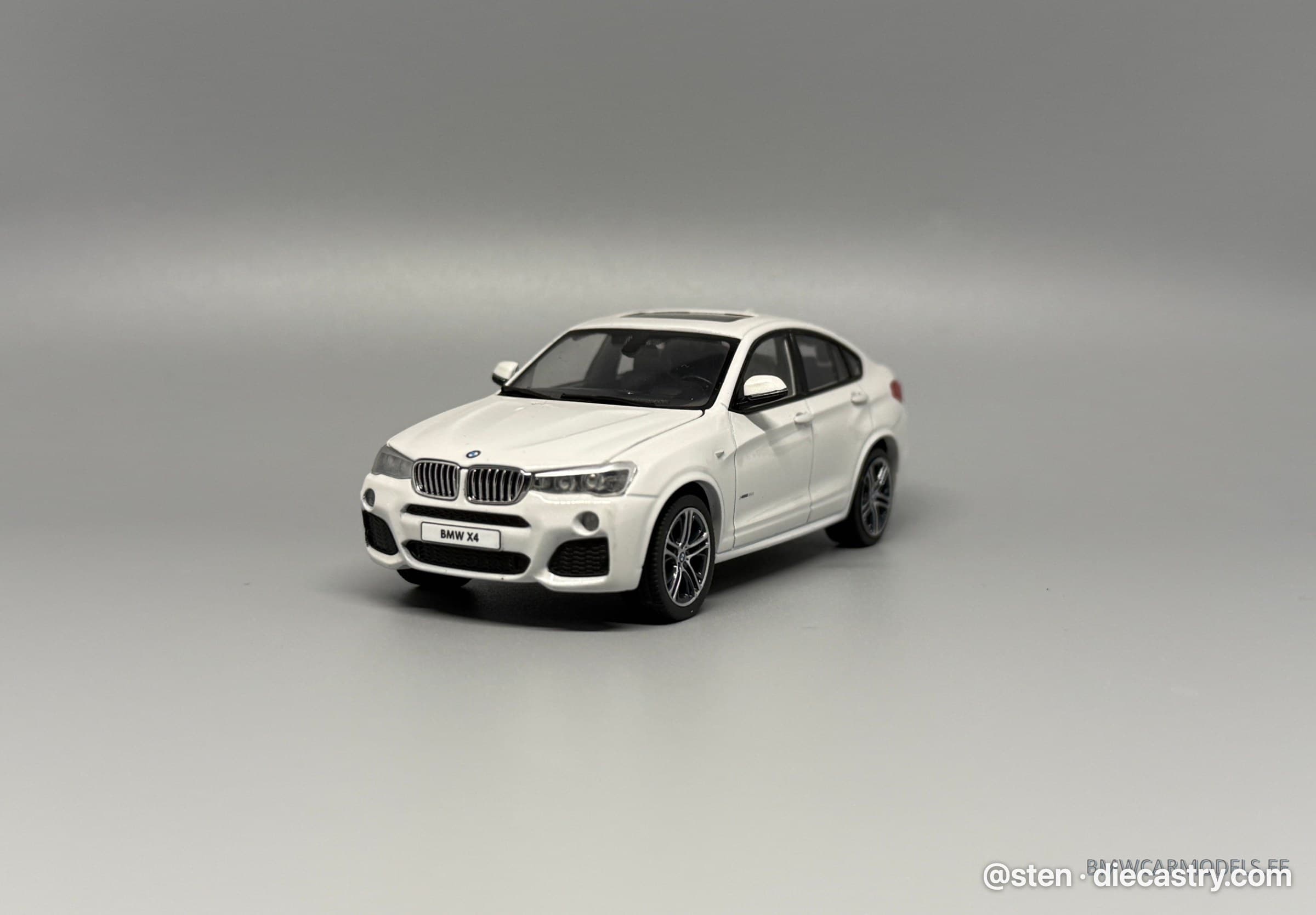 2014 BMW X4 (F26) 1:43 scale diecast model by Herpa in Mineral White Metallic