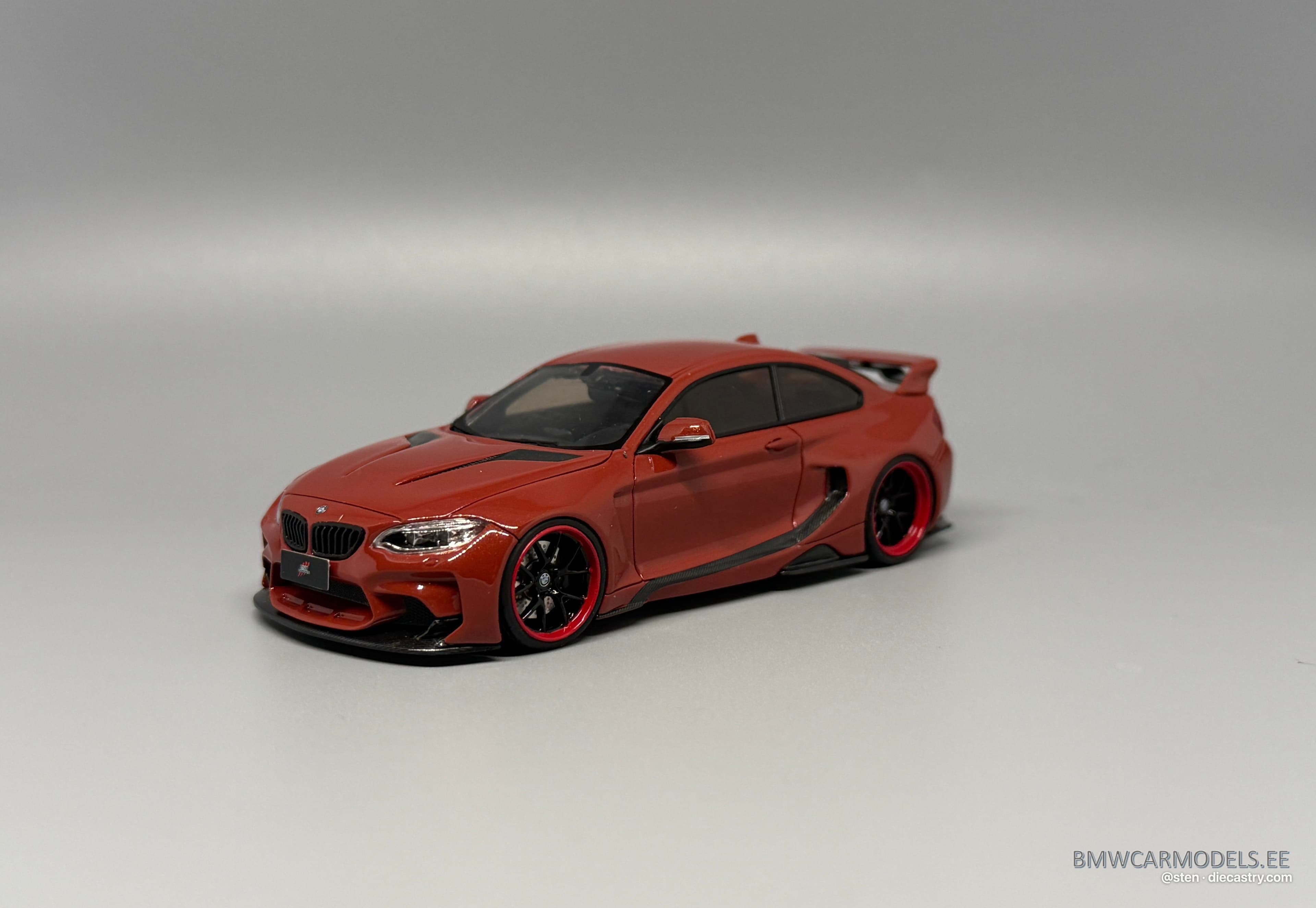 BMW BMW M235i DarwinPRO MTC Design Black Sails Widebody 1:43 scale diecast model by GLM Models in Valencia Orange