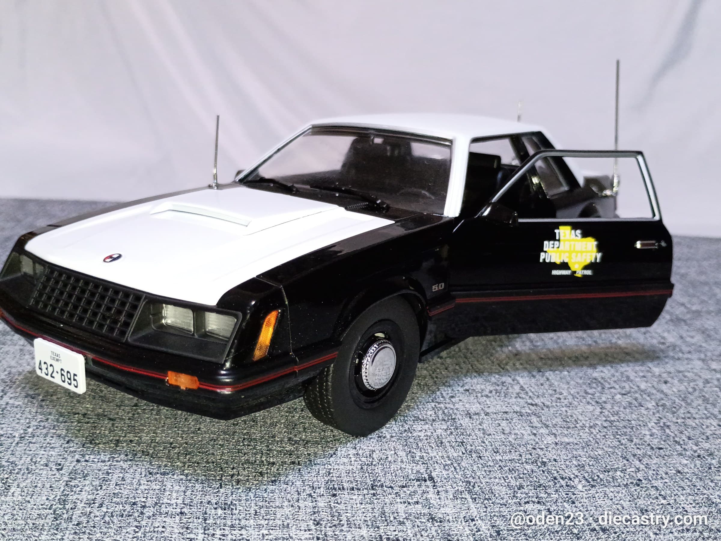 1982 Ford Mustang SSP 1:18 scale diecast model by Greenlight Collectibles in Black/White