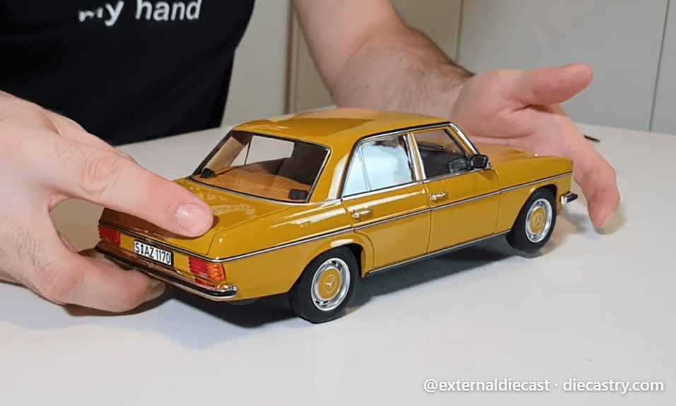 1973 Mercedes-Benz 200/8 (W115) Series 2 1:18 scale diecast model by Norev in Sahara Yellow