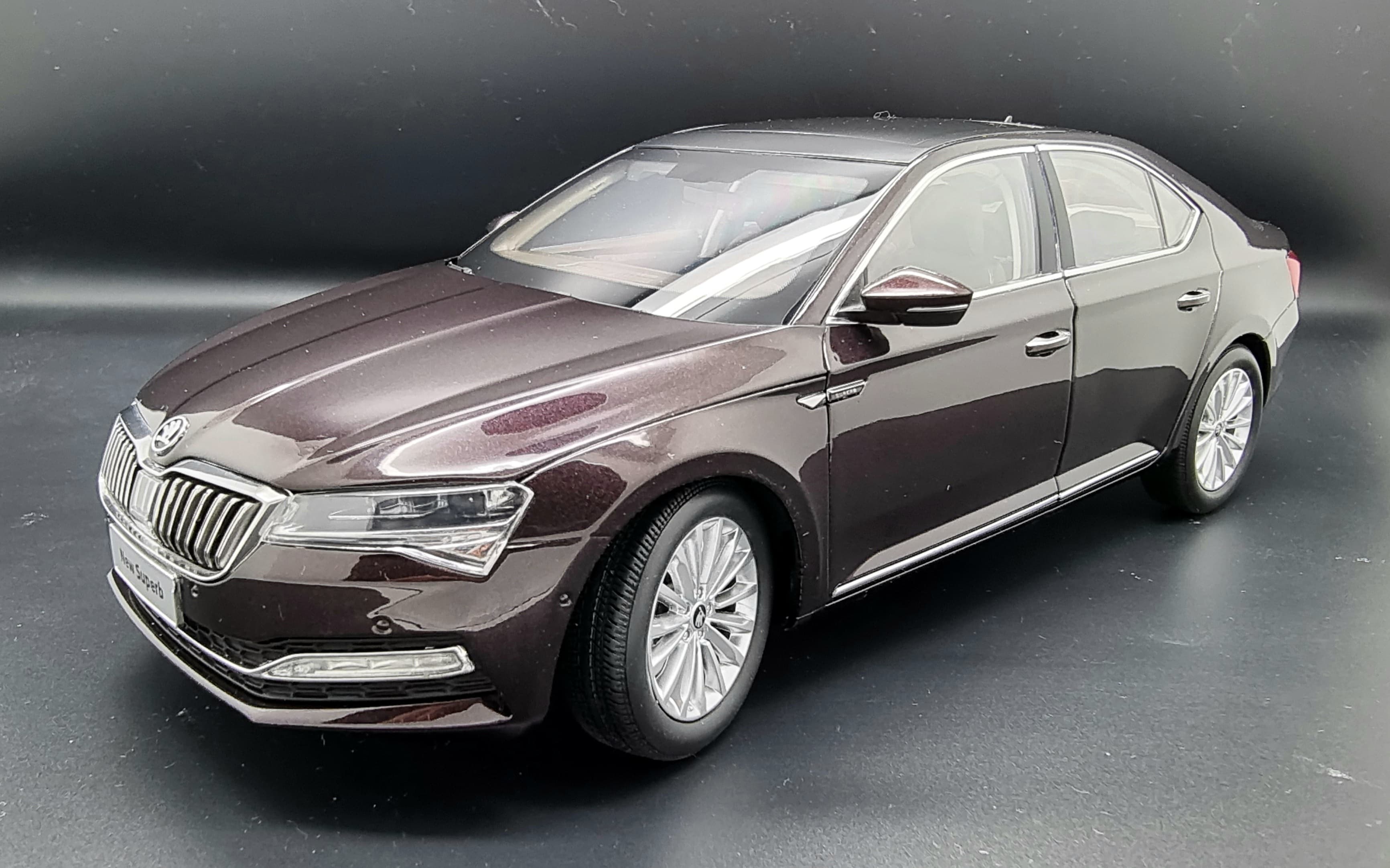 2019 Skoda Superb III Facelift 1:18 scale diecast model by Paudi Models in Purple Red