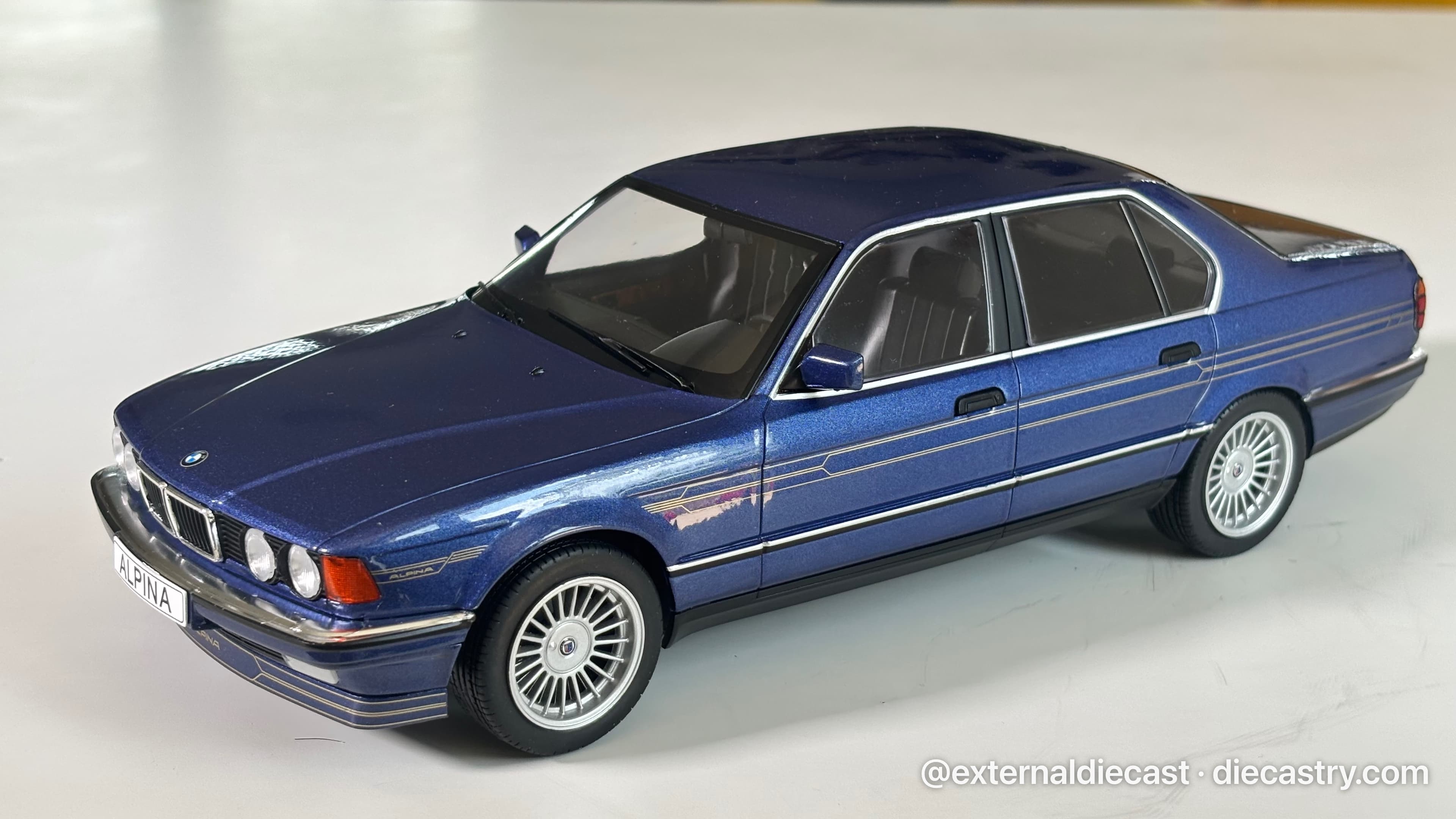 1992 BMW Alpina B11 3.5 1:18 scale diecast model by MCG Modelcar Group in Dark Blue